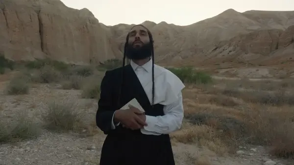 Film still of Faith 1, a three channel film by Isabel Rocamora, 22 mins, UK, 2 K to HD, 2015. Courtesy of the artist and Galeria SENDA.